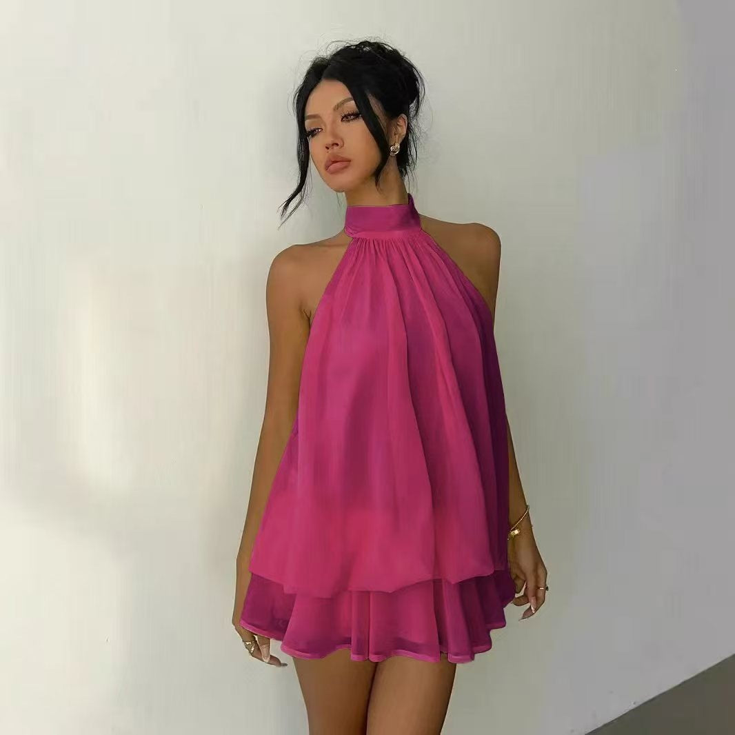 Slim-fit, sexy backless halter top with waist-cinching tie and sleeveless short skirt