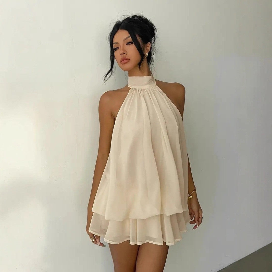 Slim-fit, sexy backless halter top with waist-cinching tie and sleeveless short skirt