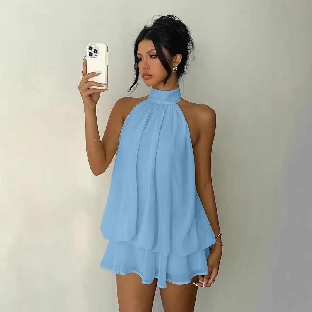 Slim-fit, sexy backless halter top with waist-cinching tie and sleeveless short skirt