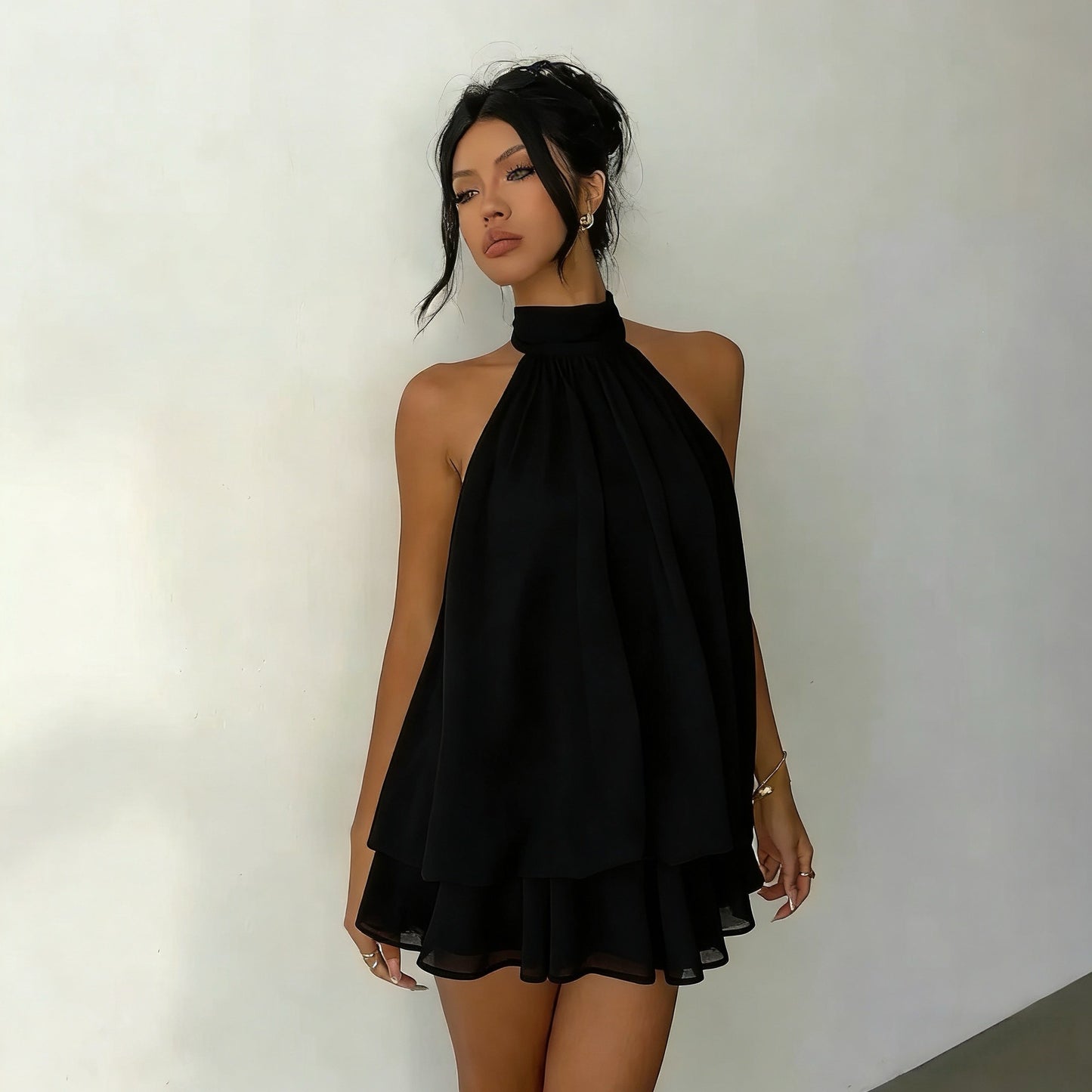 Slim-fit, sexy backless halter top with waist-cinching tie and sleeveless short skirt